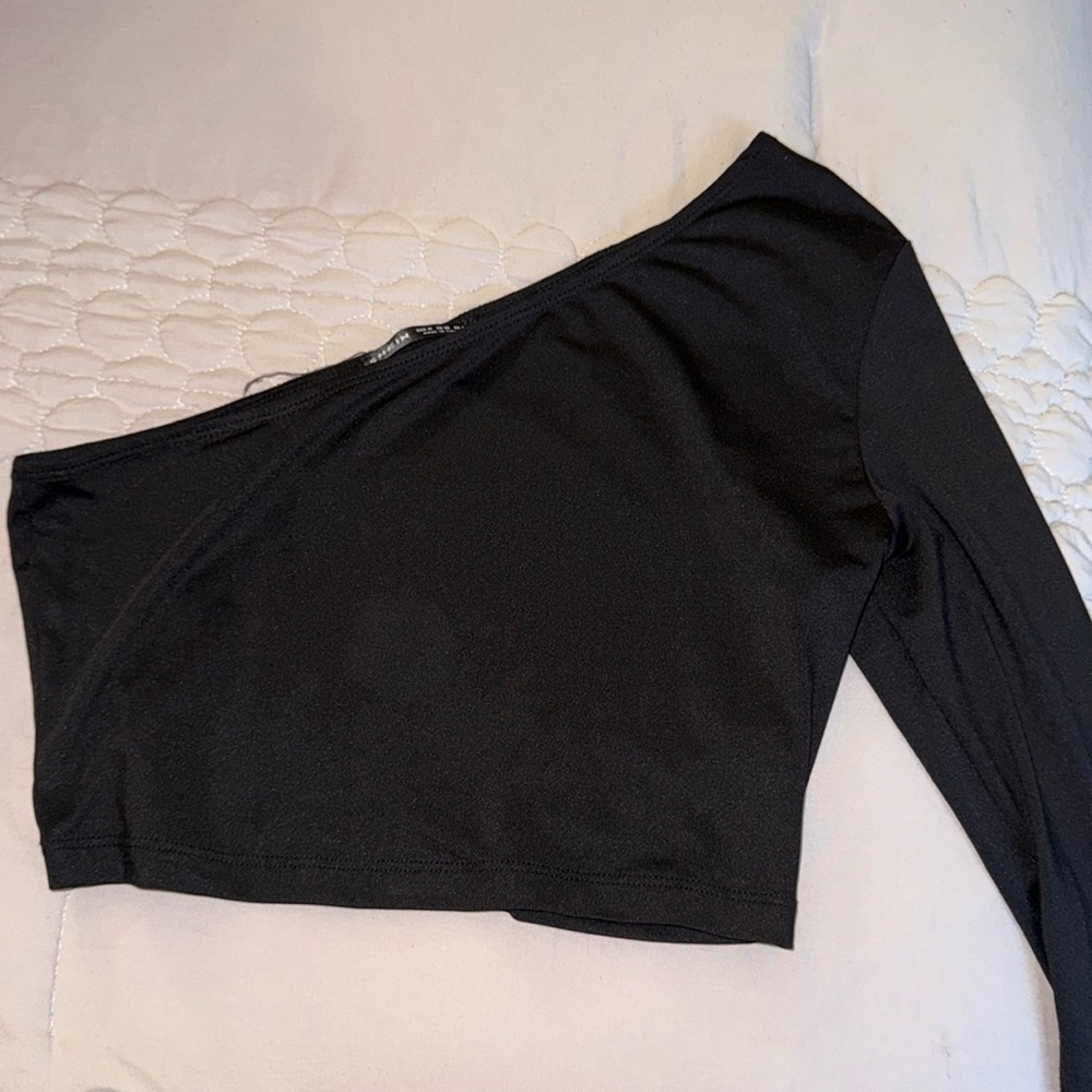 One sleeve black top